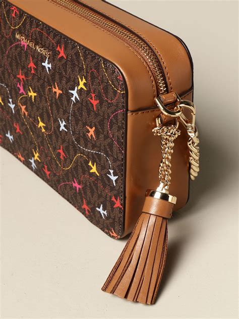 travel pouch michael kors|michael kors bag with airplanes.